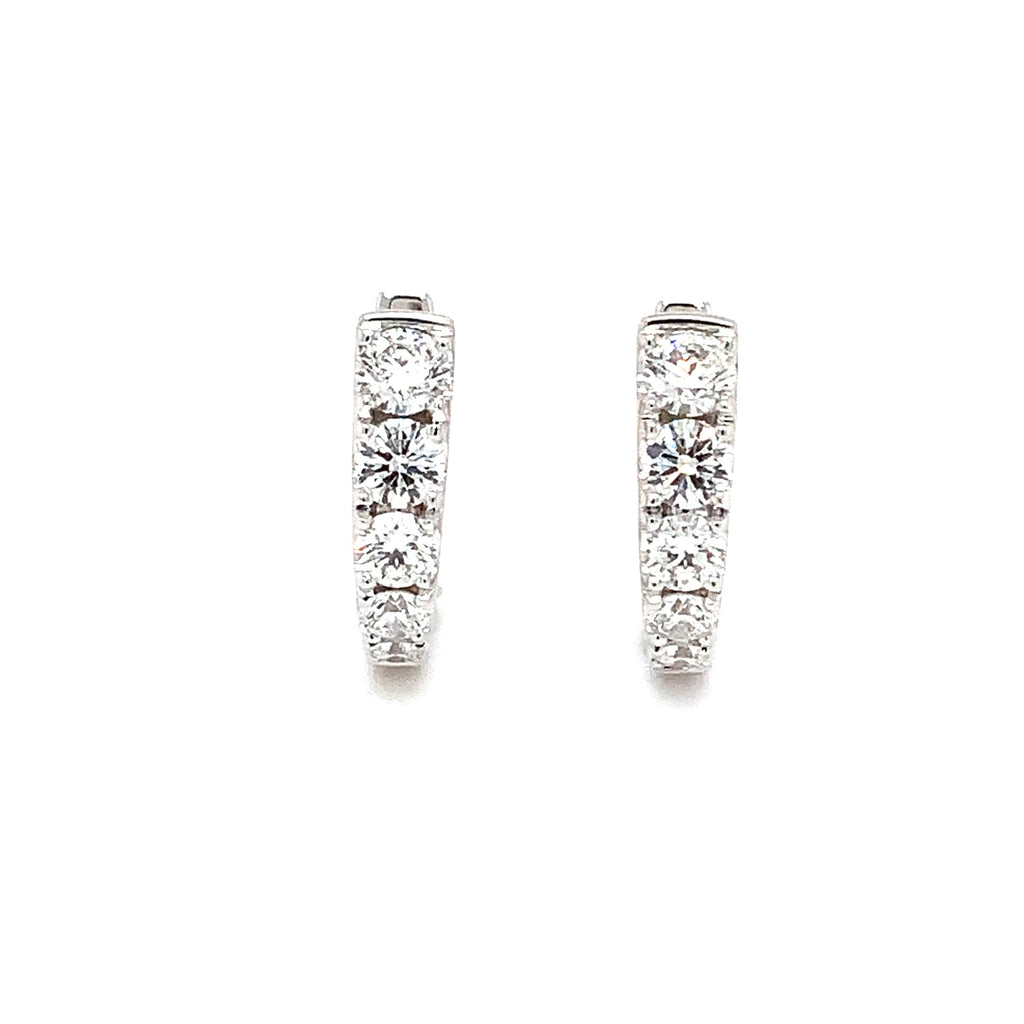 Memoire Graduated Round Brilliant Cut Diamond 0.89 ct. Huggie Earrings 18K White Gold - Image 3 of 4