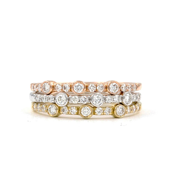 large and small round brilliant cut diamonds 0.20 ctw bezel set band 14k rose gold