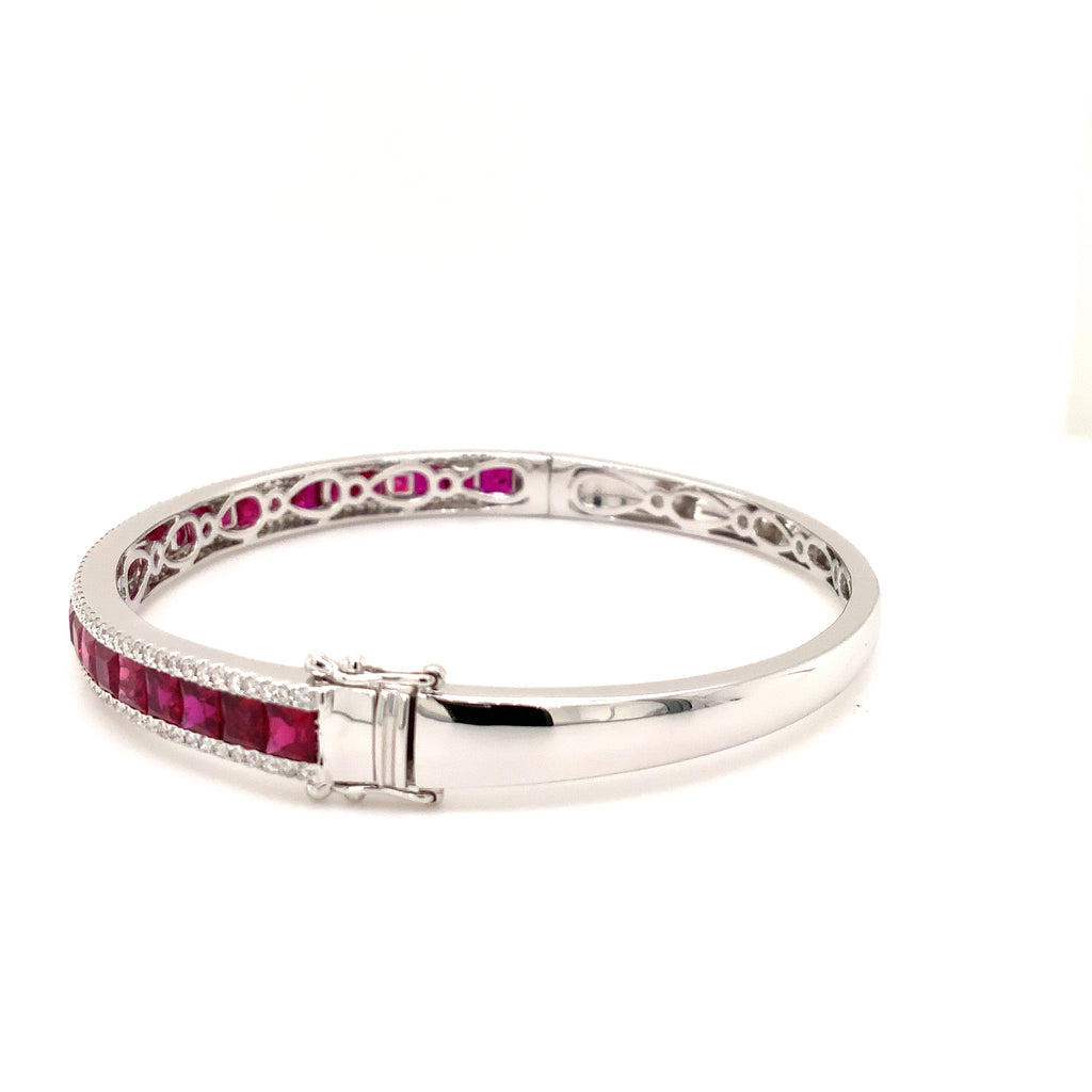 fine burmese princess cut ruby and diamond bangle bracelet in 18 kt white gold.