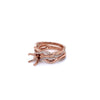 rose gold 4 prong basket diamond semi-mounting swirling wedding set in 14 kt.