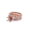 rose gold 4 prong basket diamond semi-mounting swirling wedding set in 14 kt.