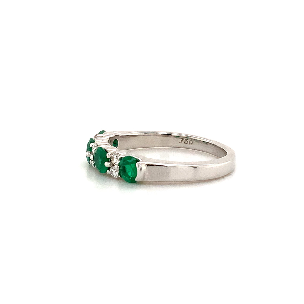 classic emerald and diamond straight line shared prong band in 18k white gold