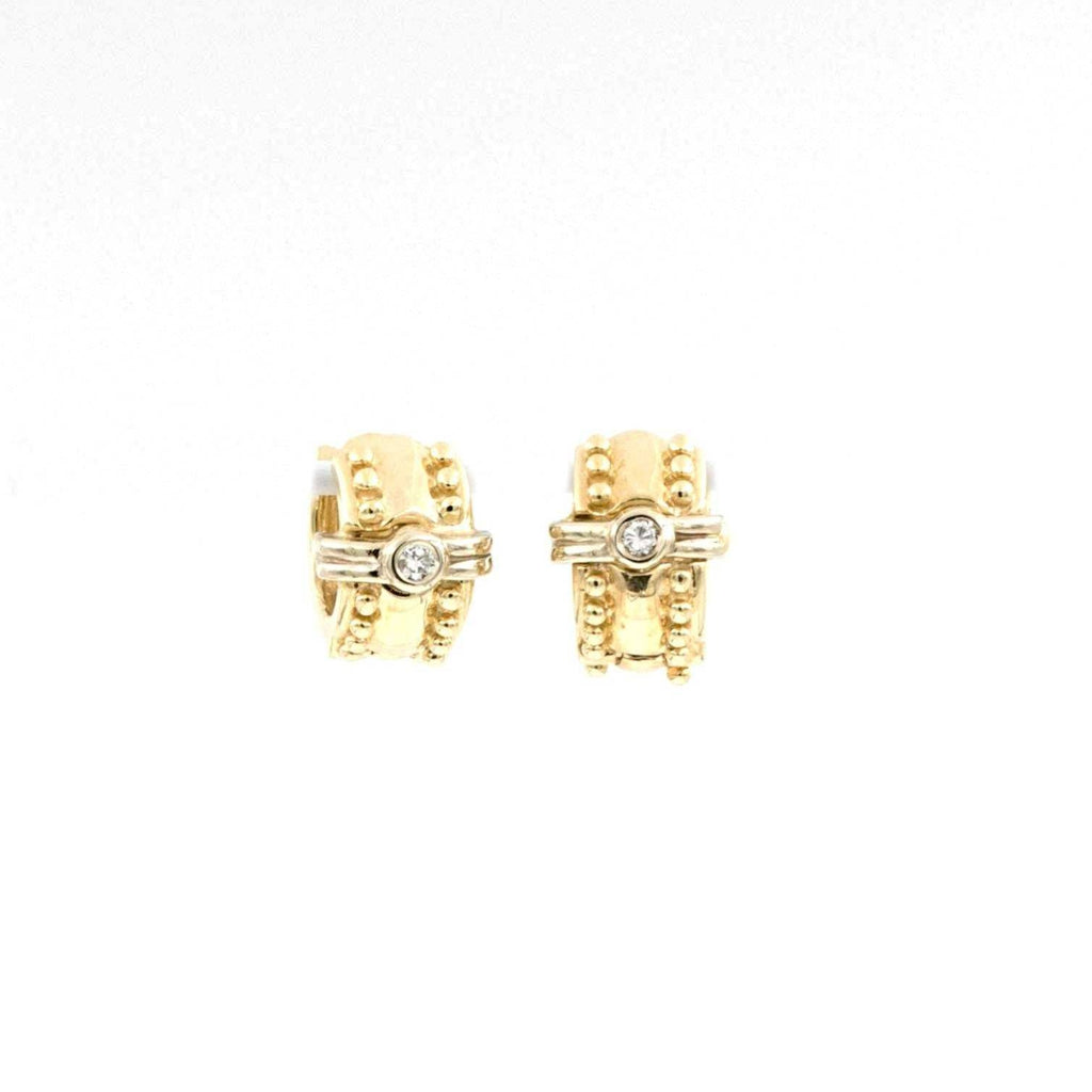 beaded bezel set diamond huggie earring 14k yellow and white gold