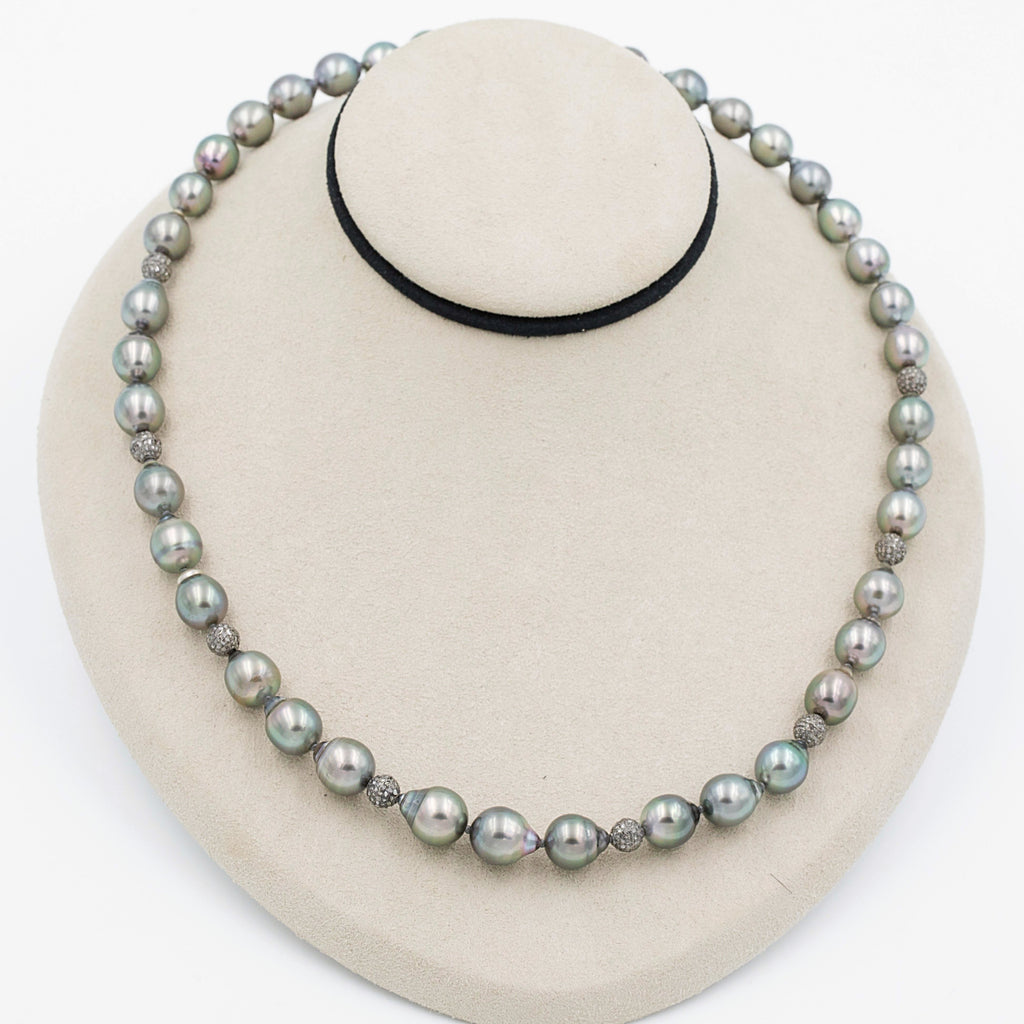 cultured circle natural black tahitian south sea 9.0 - 9.5 mm pearl knotted strand with diamond paved beads in sterling silver.