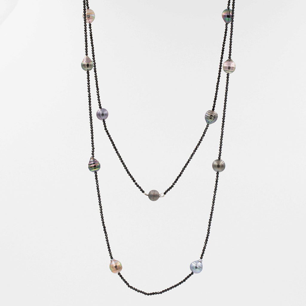 cultured circle tahitian black pearl and black spinel bead 36 inch necklace.
