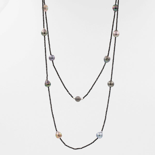cultured circle tahitian black pearl and black spinel bead 36 inch necklace.