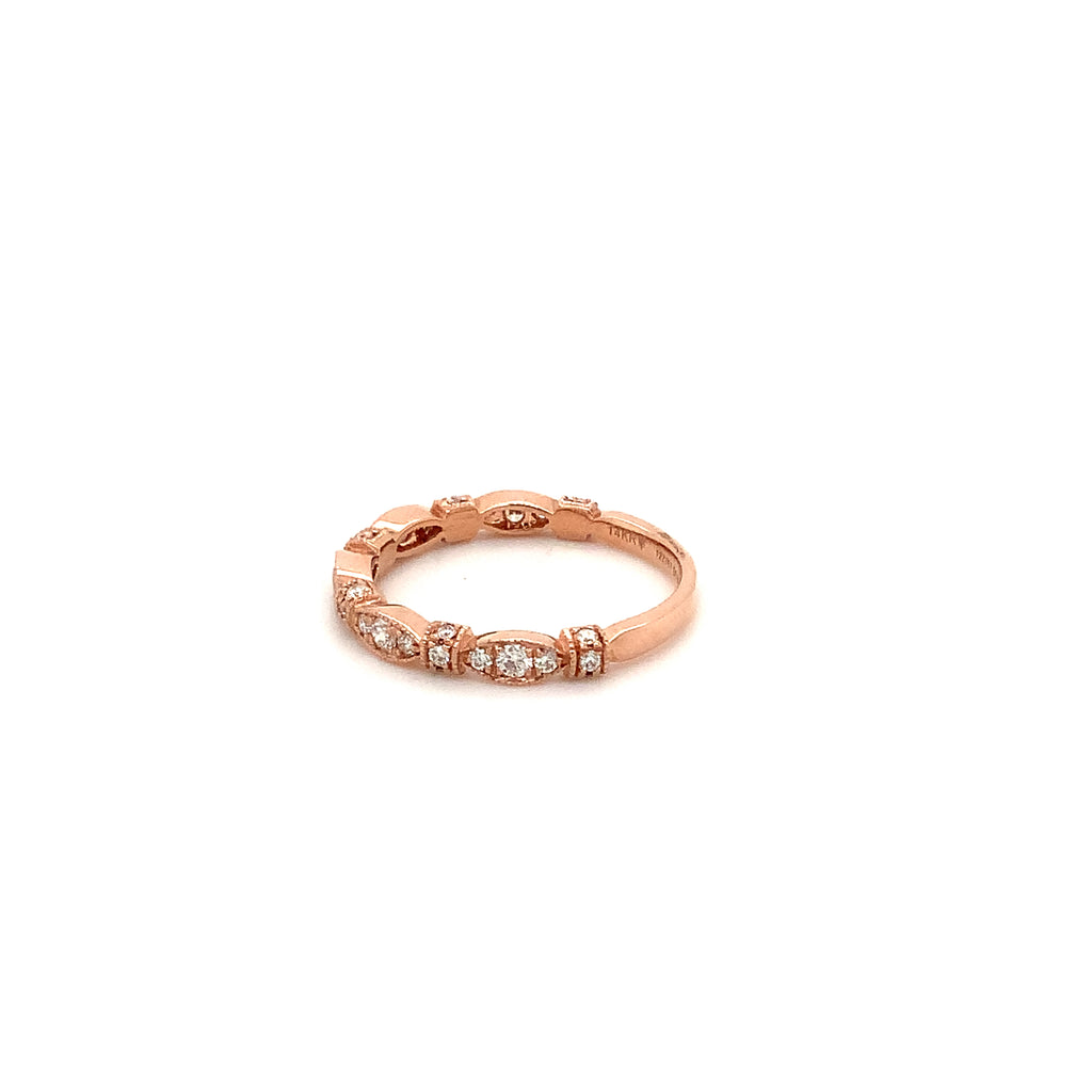 fancy stackable diamond pave band set with brilliant cut diamonds in 14 kt rose gold.