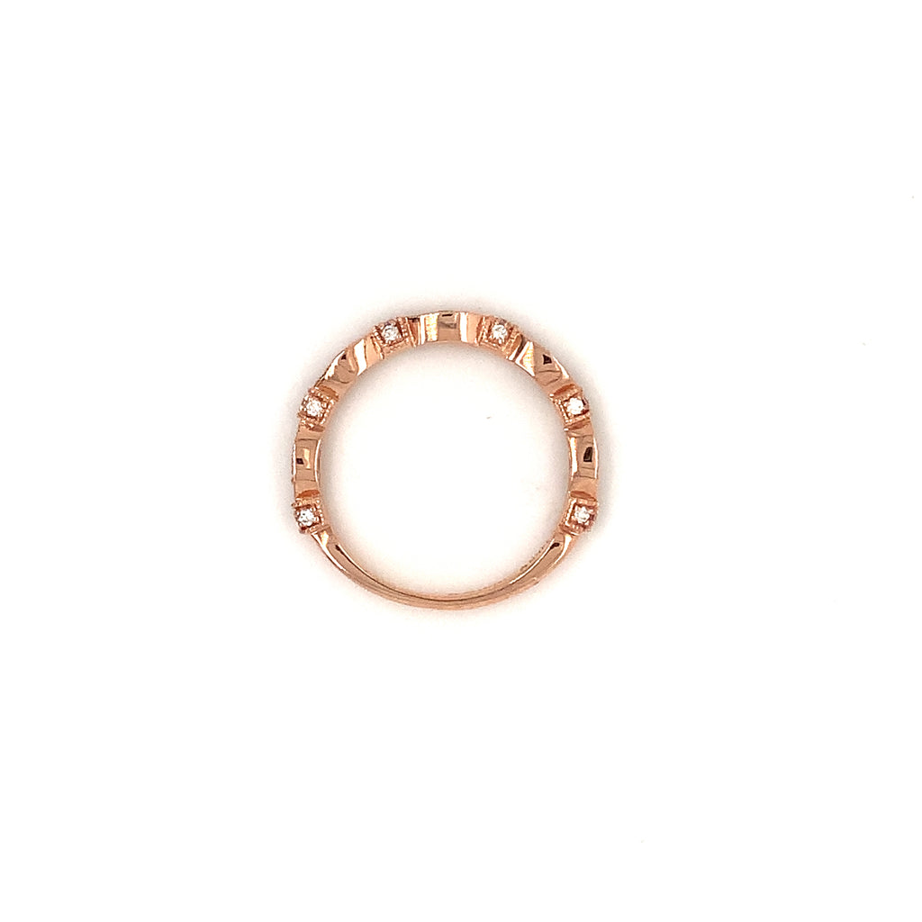 fancy stackable diamond pave band set with brilliant cut diamonds in 14 kt rose gold.