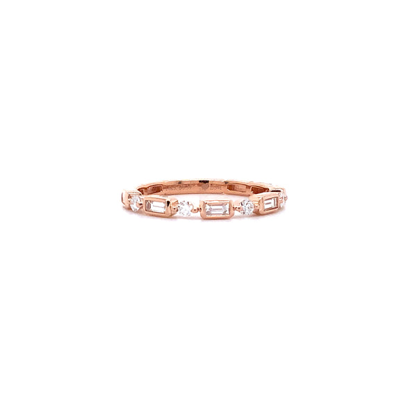 stackable  baguette and brilliant cut diamond band set in 14 kt rose gold.