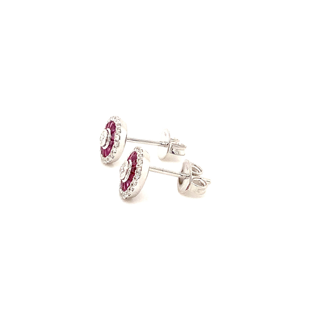 deco style ruby baguette and brilliant cut diamond earring set in 14 kt white gold.