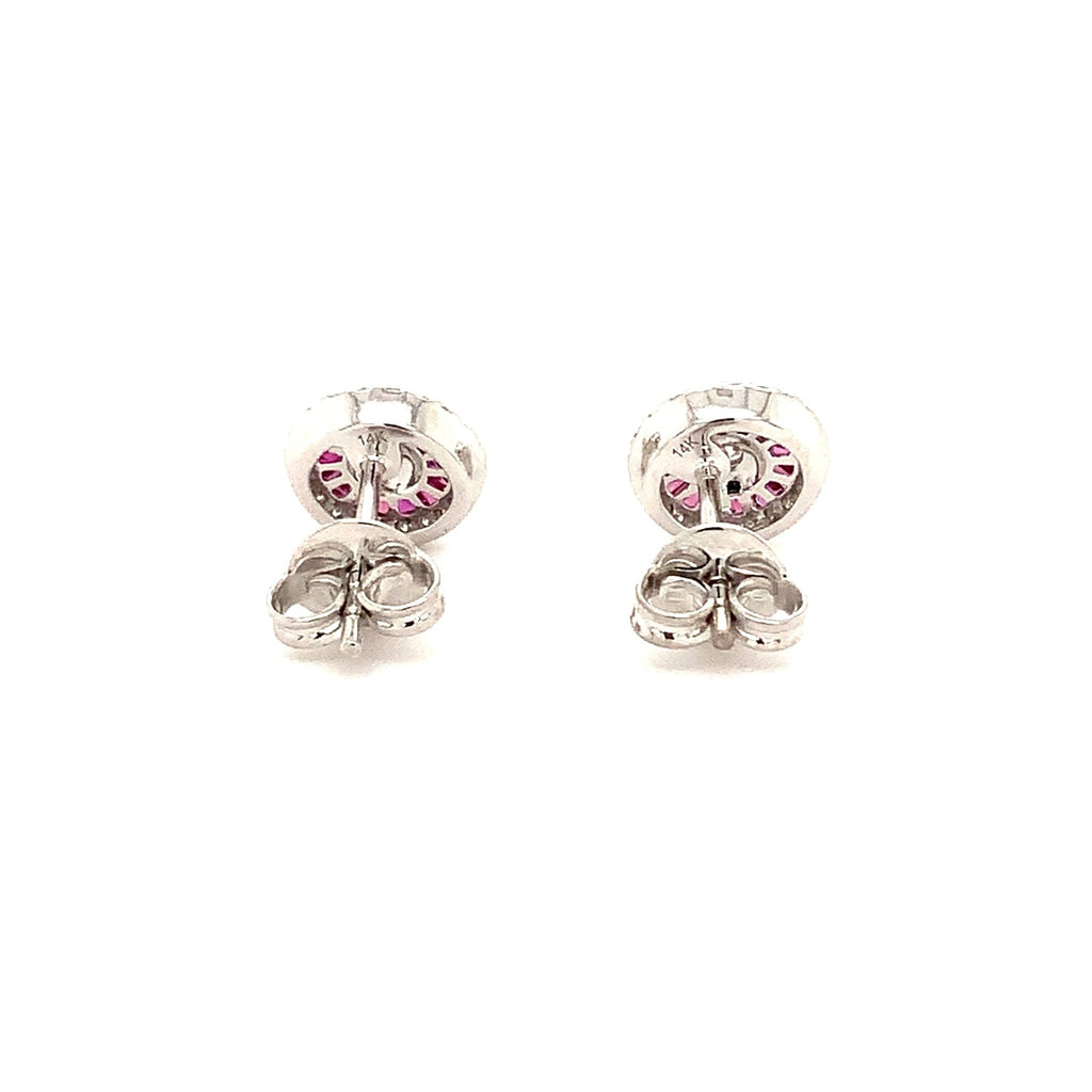 deco style ruby baguette and brilliant cut diamond earring set in 14 kt white gold.
