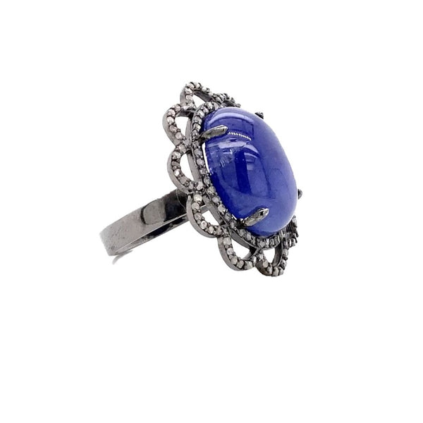 large oval cabochon tanzanite and diamond ring in oxidized sterling silver.