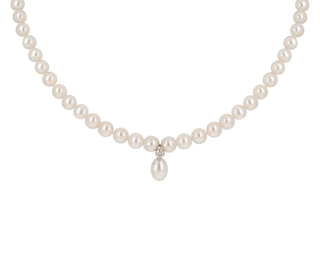white freshwater pearl and diamond drop necklace.