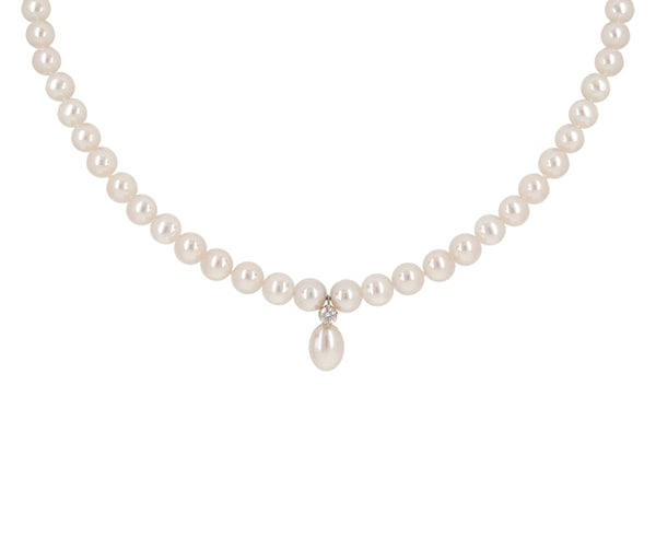 white freshwater pearl and diamond drop necklace.