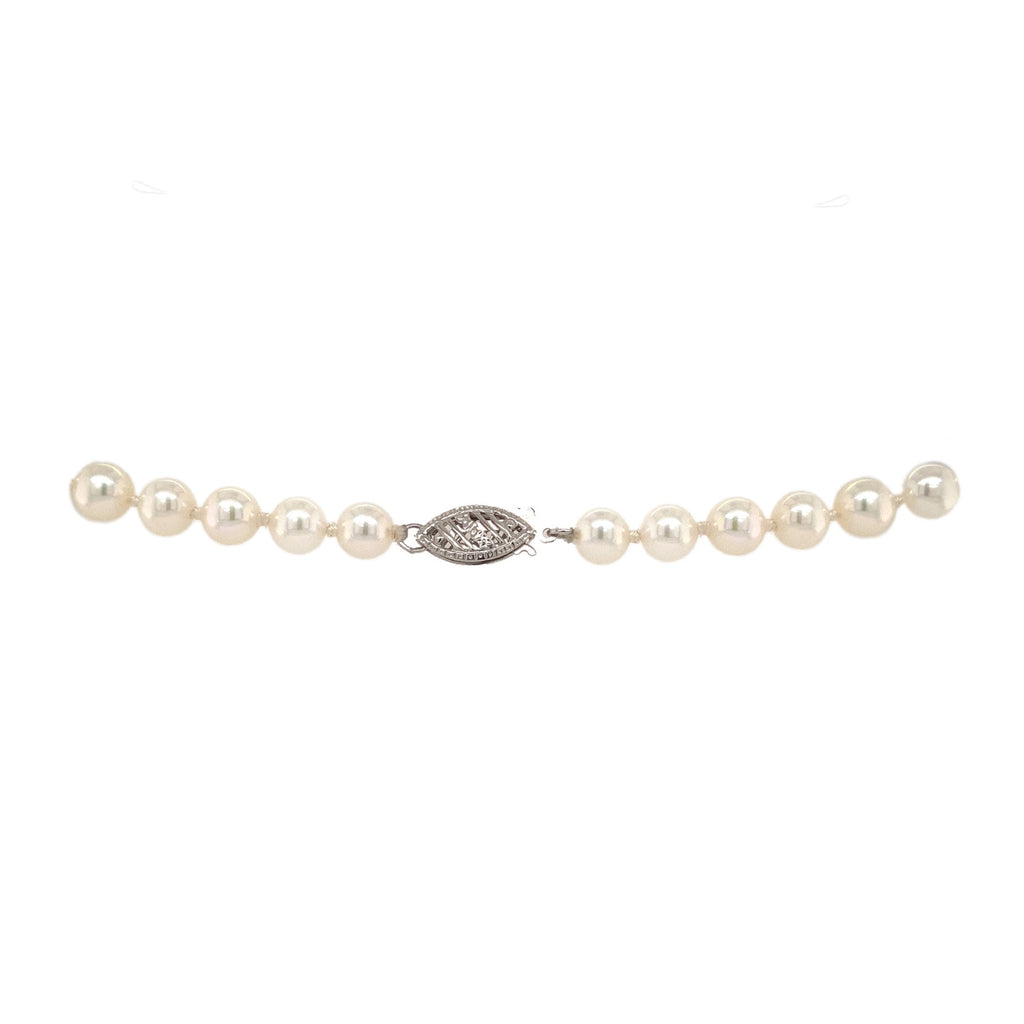 white akoya and south sea tahitian pearl and diamond drop necklace.