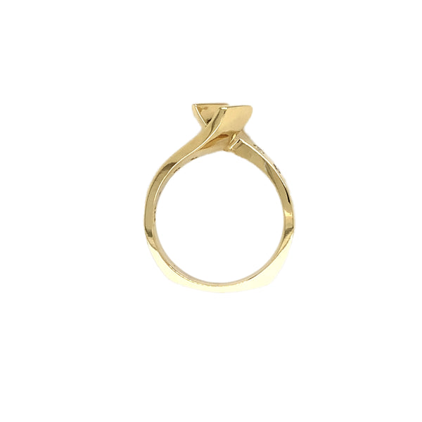 modern diamond channel set bi- pass semi mounting in 14 kt yellow gold by dioro.