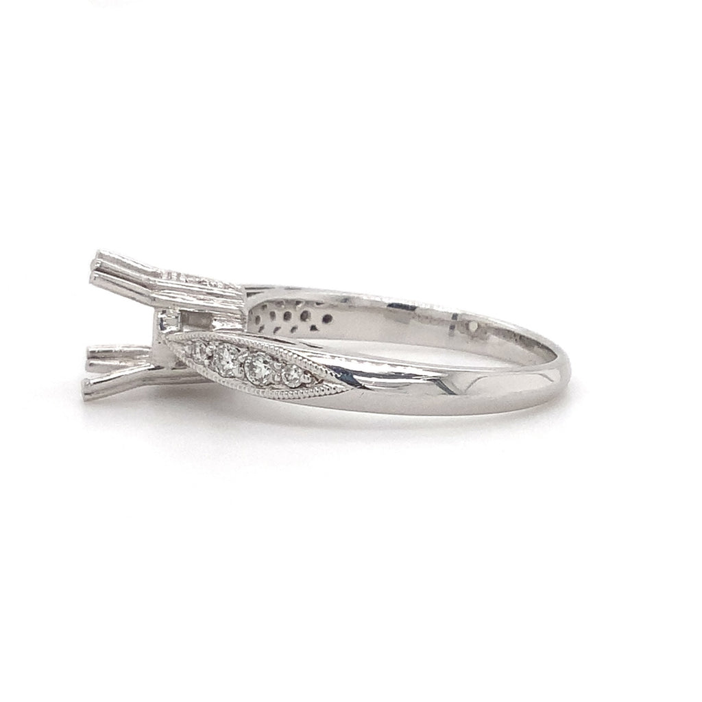 platinum semi mounting 8 round brilliant diamonds equals to .12ctw holds up to 6.5mm to 7mm stone