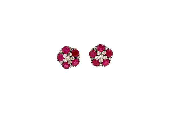 ruby and diamond flower design earring in oxidized sterling silver.