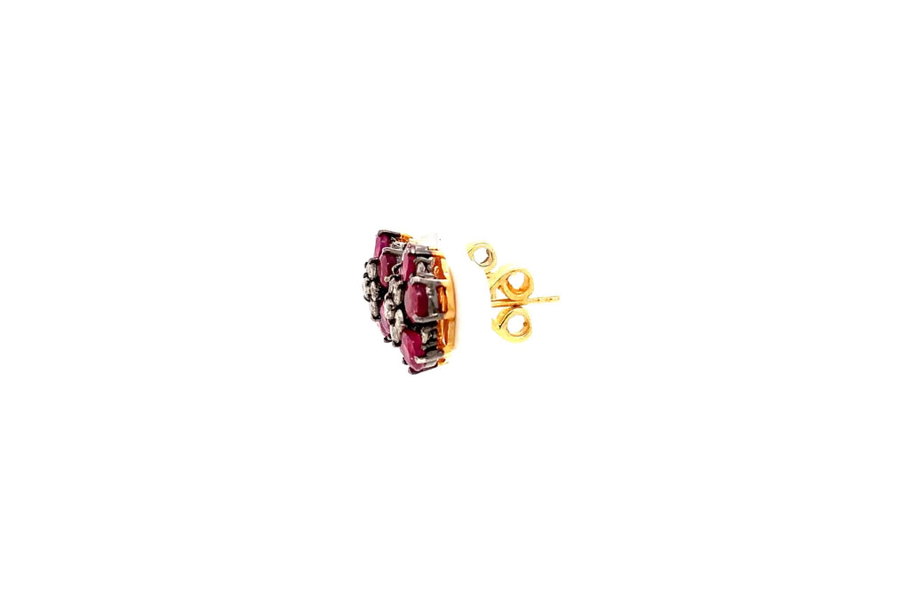ruby and diamond flower design earring in oxidized sterling silver.