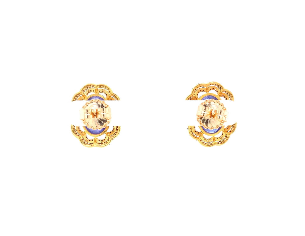 oval cabochon tanzanite and diamond earring in oxidized sterling silver gold vermeil.