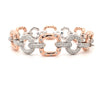 diamond pavée  link bracelet in 14 kt rose and white gold.