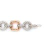 diamond pavée  link bracelet in 14 kt rose and white gold.