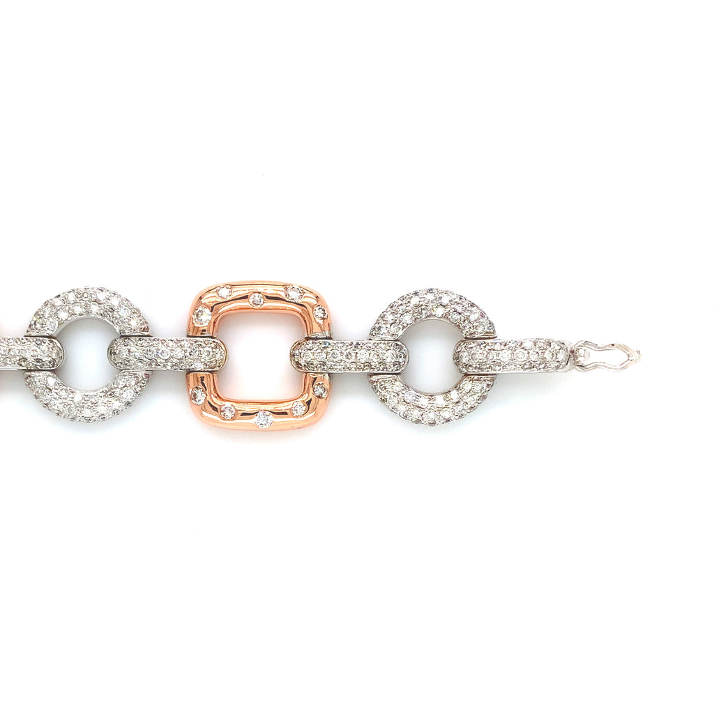 diamond pavée  link bracelet in 14 kt rose and white gold.