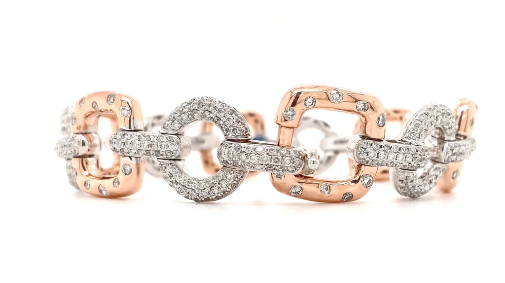 diamond pavée  link bracelet in 14 kt rose and white gold.