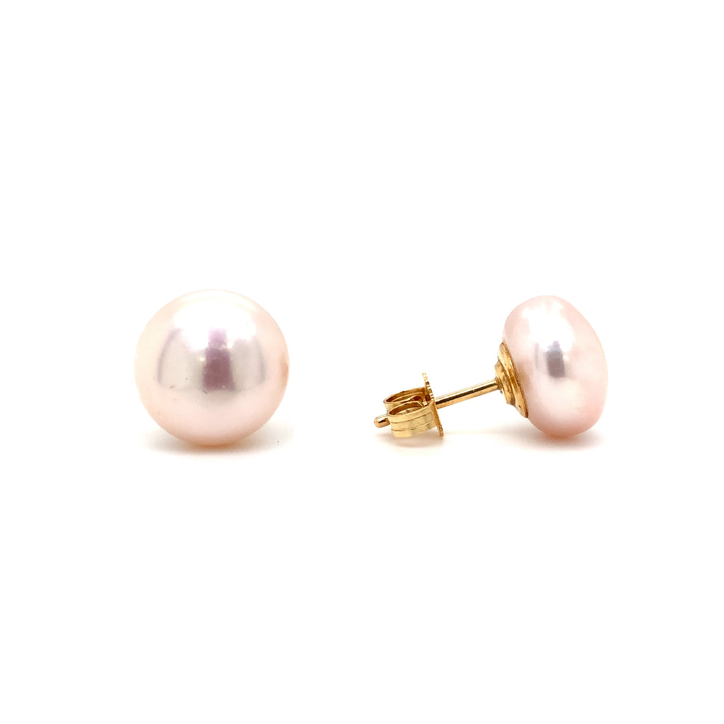 pinkish freshwater pearl stud earrings in 14k of yellow gold