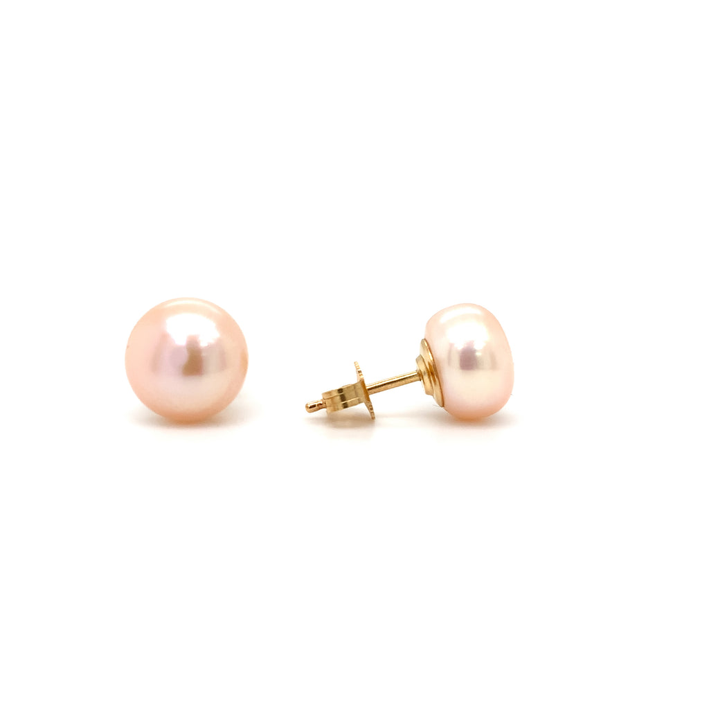peach freshwater pearl stud earrings in 14k yellow gold