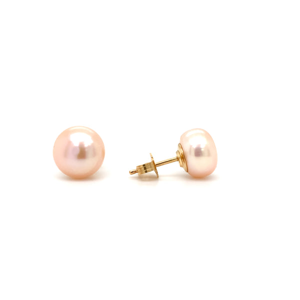 peach freshwater pearl stud earrings in 14k yellow gold