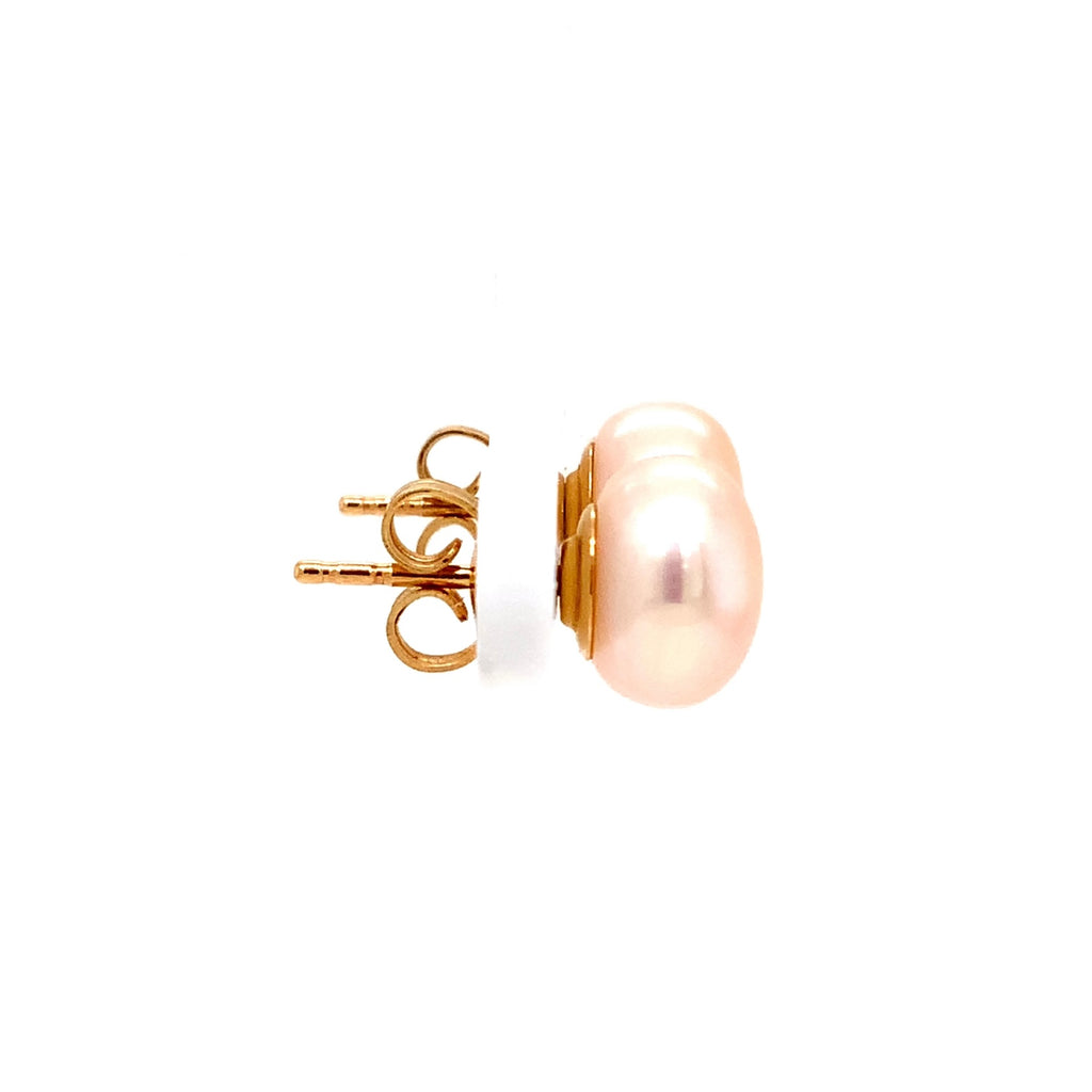peach freshwater pearl stud earrings in 14k yellow gold