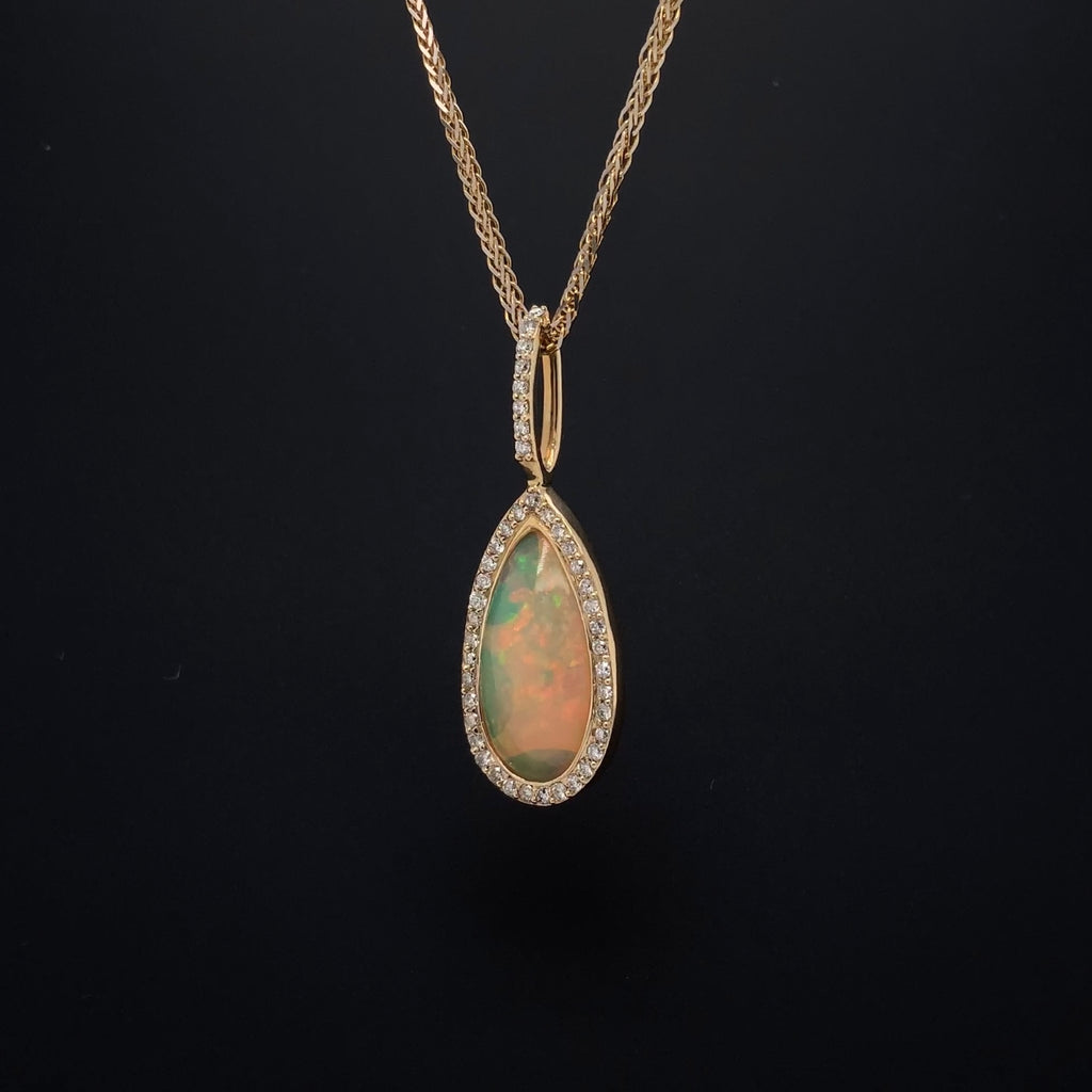 asba collection natural crystal pear-shaped opal pendant with diamond halo in 14k yellow gold