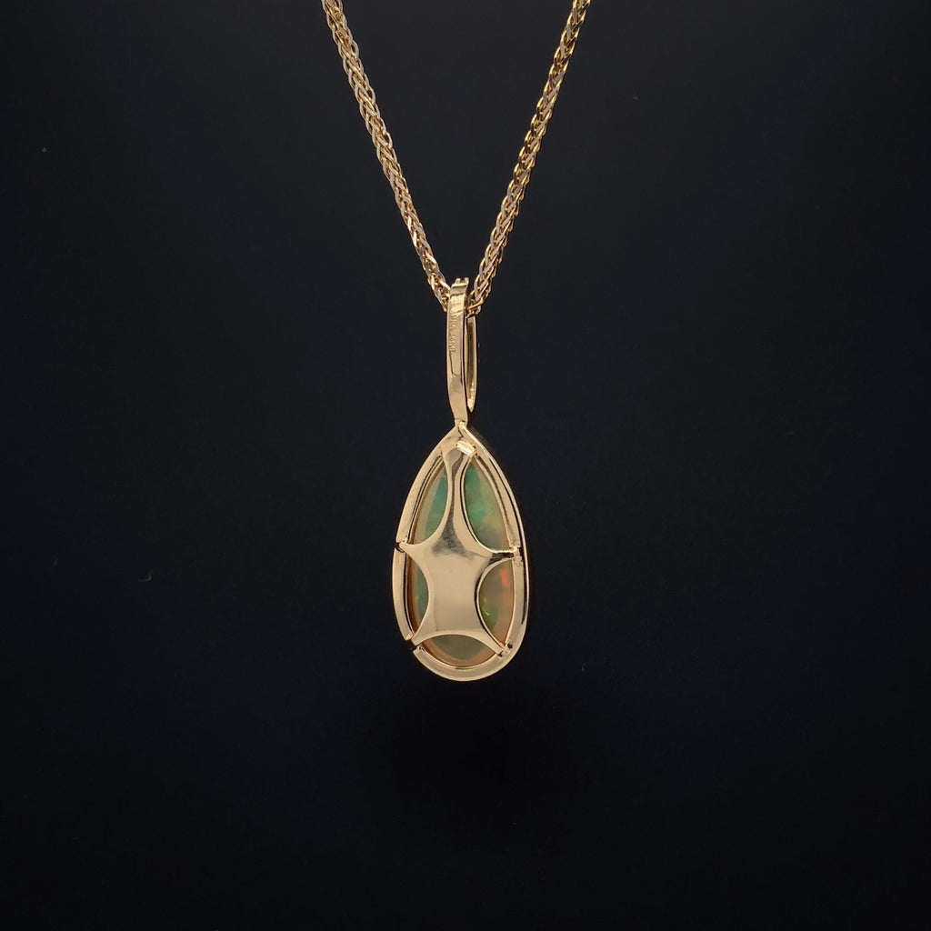asba collection natural crystal pear-shaped opal pendant with diamond halo in 14k yellow gold