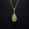 asba collection natural crystal pear-shaped opal pendant with diamond halo in 14k yellow gold