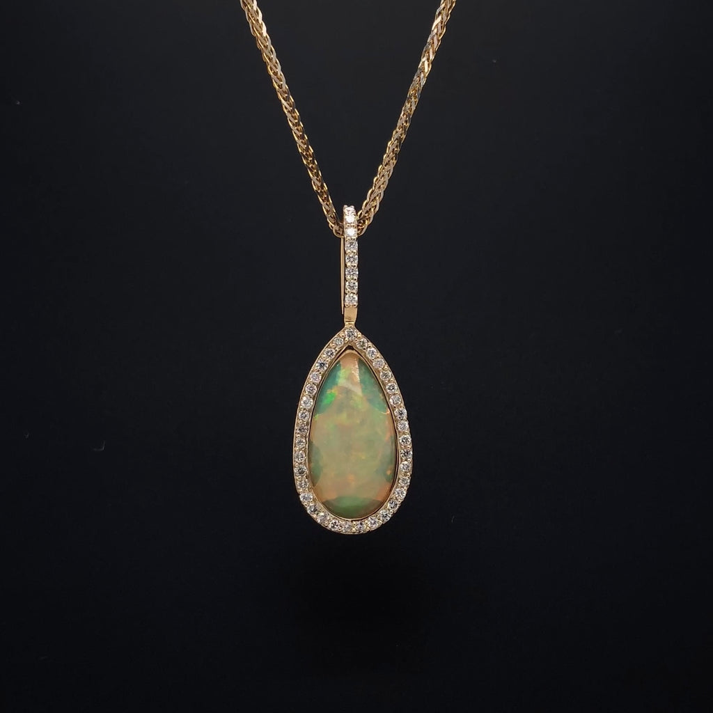 asba collection natural crystal pear-shaped opal pendant with diamond halo in 14k yellow gold