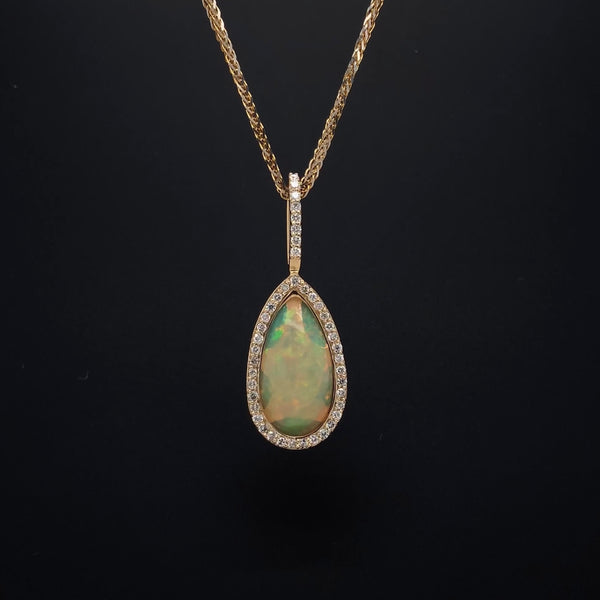 asba collection natural crystal pear-shaped opal pendant with diamond halo in 14k yellow gold