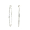cz inside-out hoop earrings in gold color with secure lock