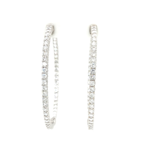 cz inside-out hoop earrings in gold color with secure lock
