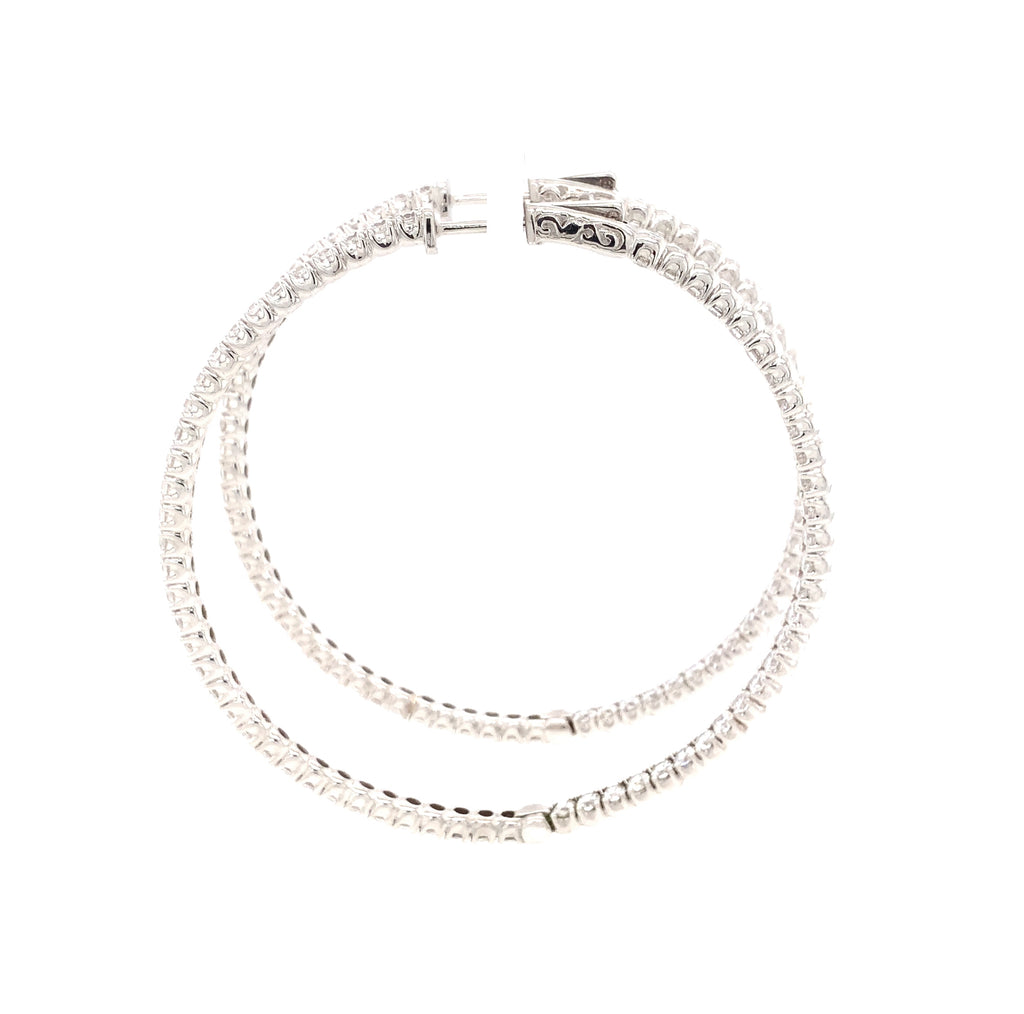 cz inside-out hoop earrings in gold color with secure lock