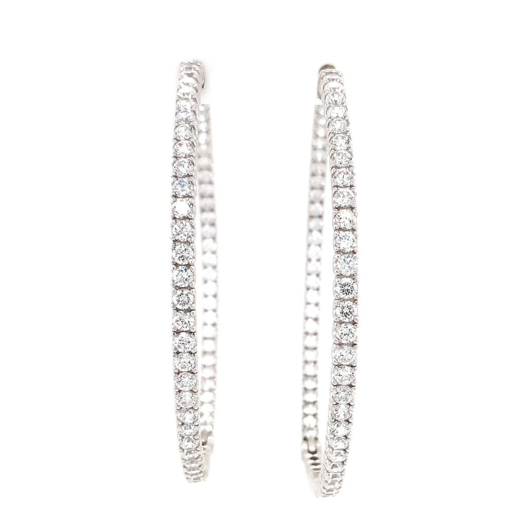 cz inside-out hoop earrings in gold color with secure lock