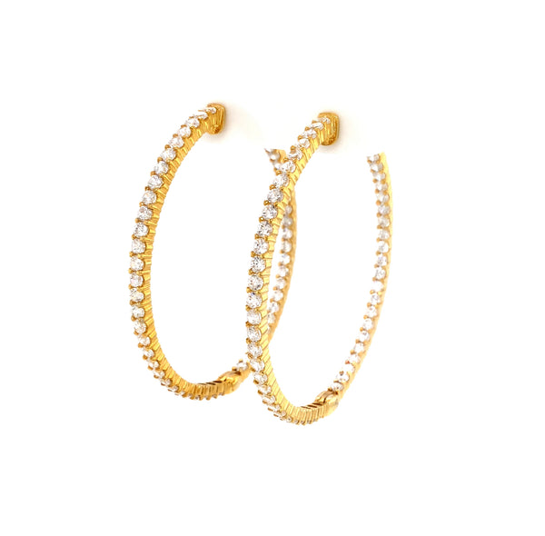 cz inside-out hoop earrings in gold color with secure lock