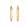 cz inside-out hoop earrings in gold color with secure lock