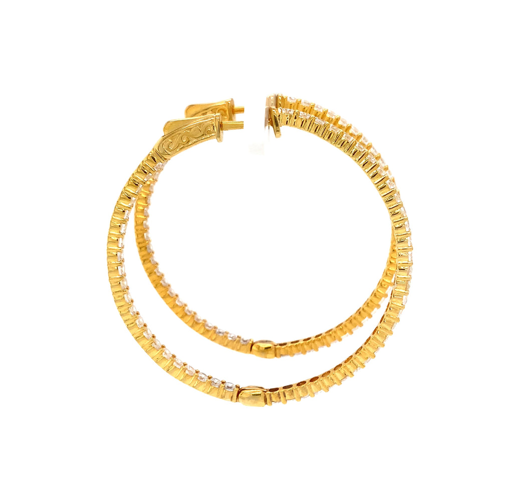 cz inside-out hoop earrings in gold color with secure lock