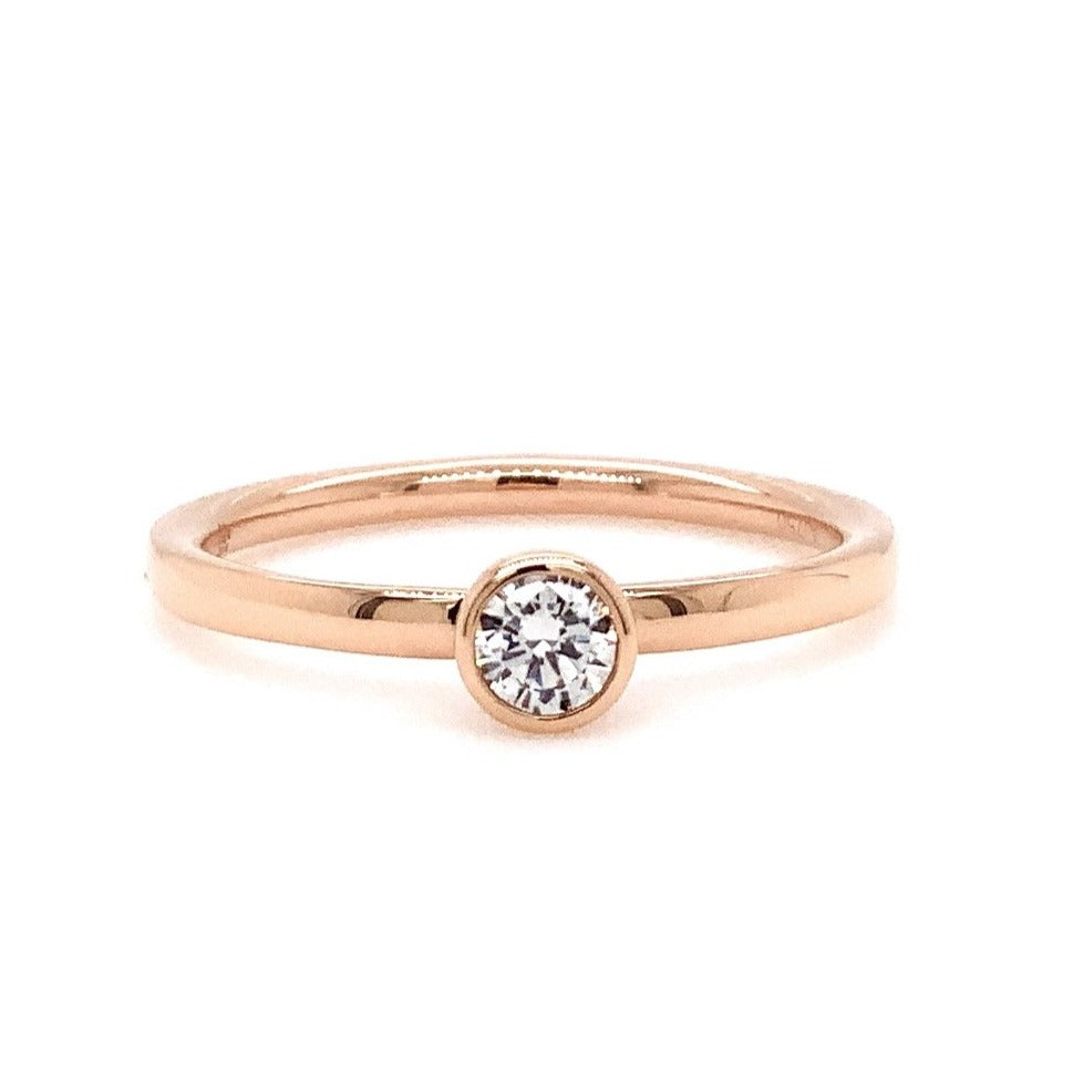 Memoire Round Diamond 0.16 Bezel Set Stackable Ring in 18 kt Rose Gold - Image 1 of 4