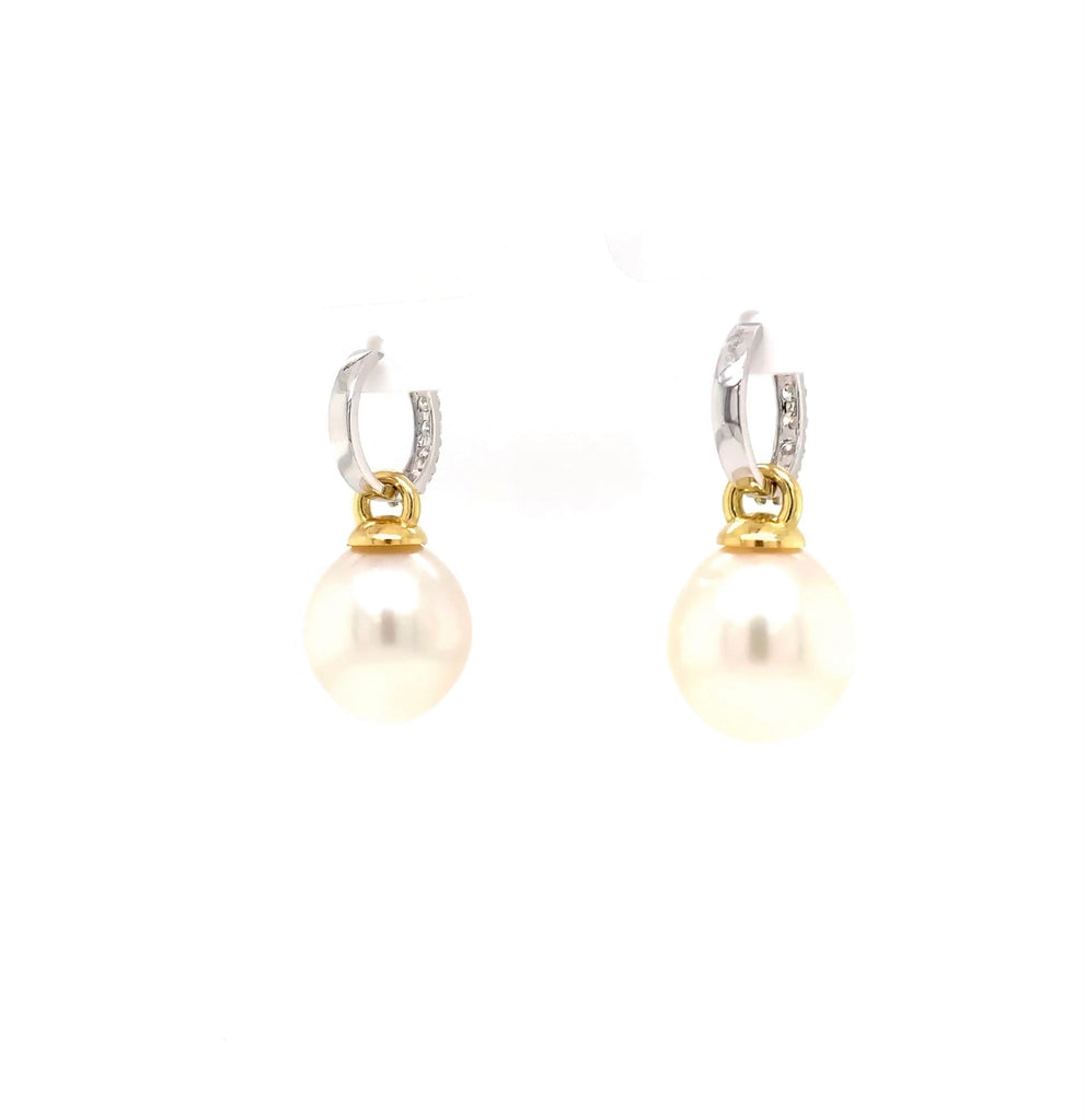 large oval drop papalsey cultured 15 mm white south sea pearl and diamond huggie earring.18 karat white and yellow gold.