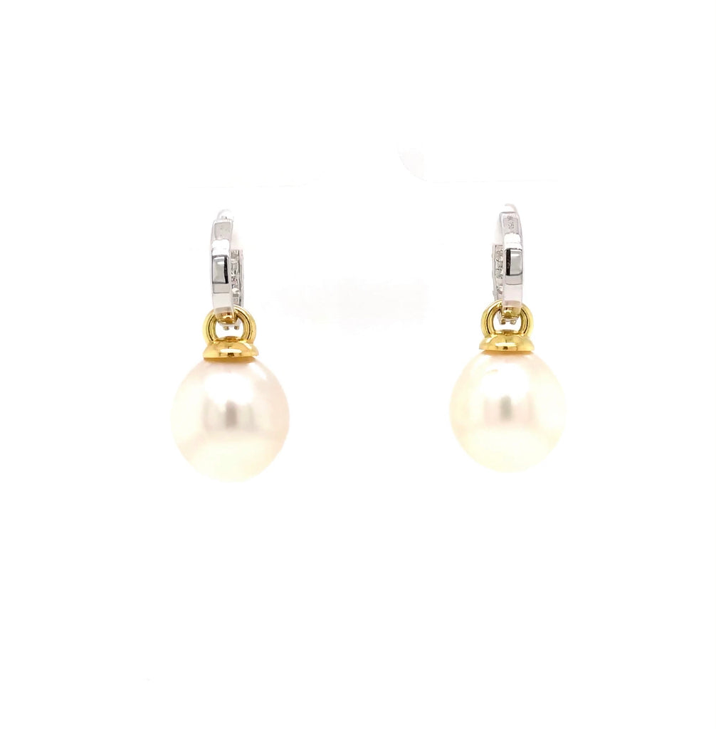 large oval drop papalsey cultured 15 mm white south sea pearl and diamond huggie earring.18 karat white and yellow gold.