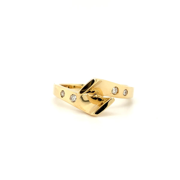 modern diamond channel set bi- pass semi mounting in 14 kt yellow gold by dioro.