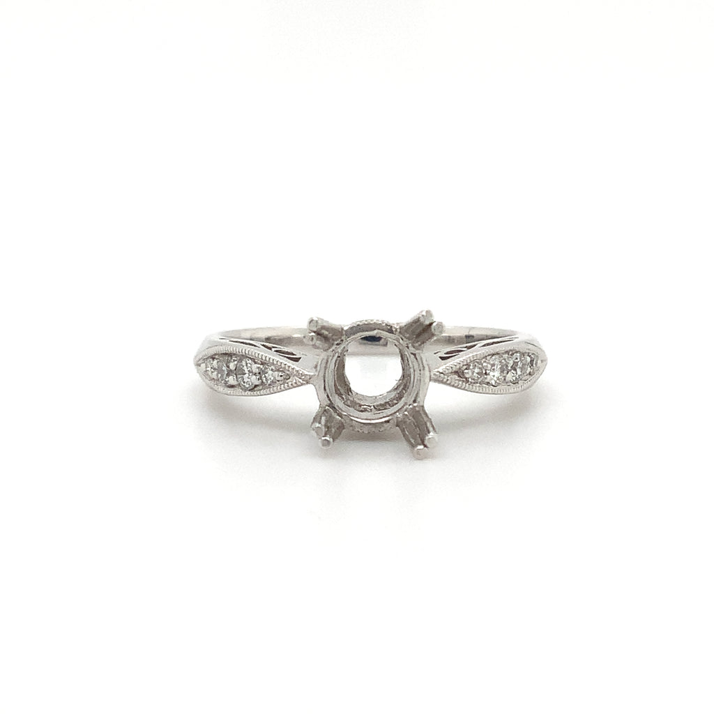 platinum semi mounting 8 round brilliant diamonds equals to .12ctw holds up to 6.5mm to 7mm stone