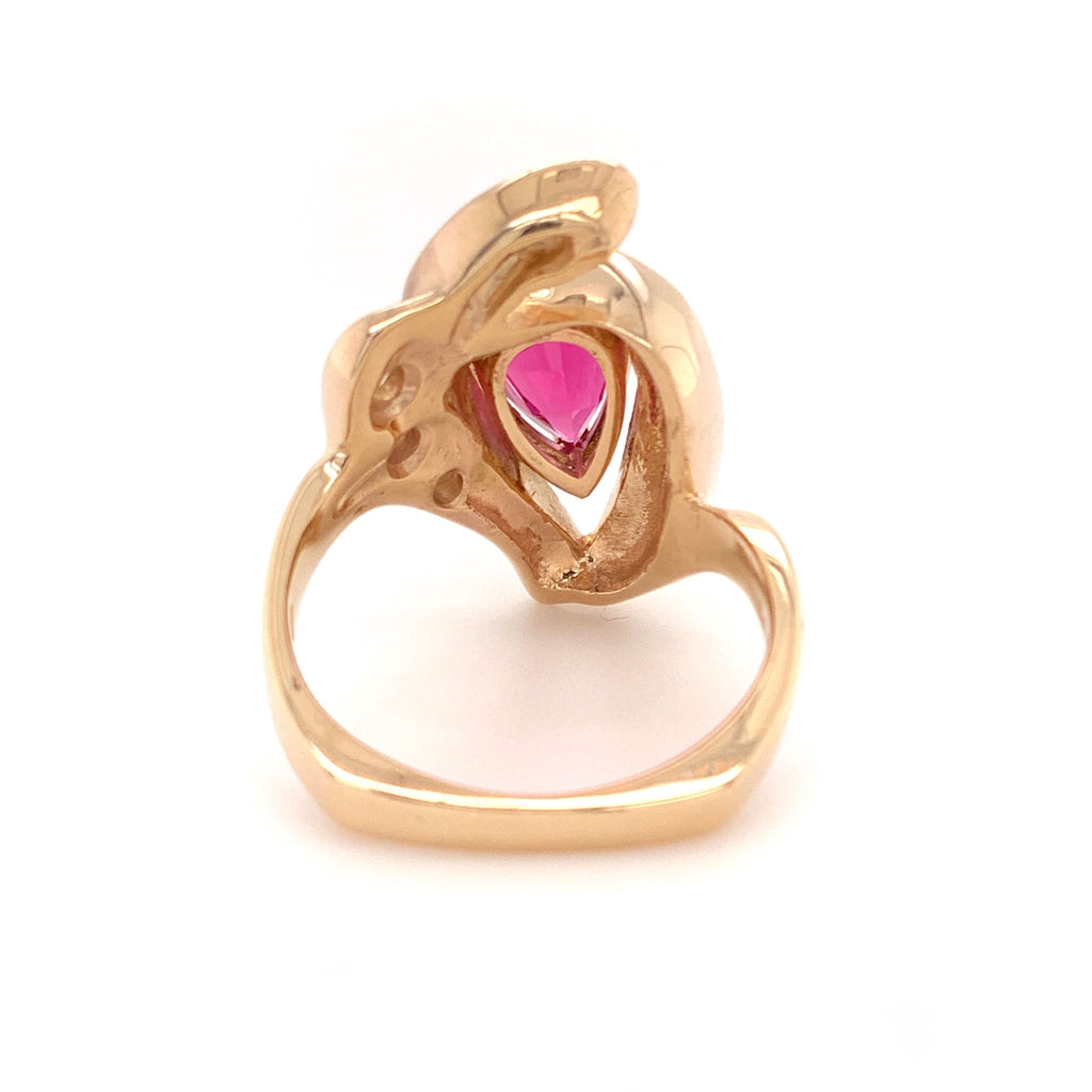 pear shape pink tourmaline (rubelite) and diamond ring in 14 kt yellow gold.